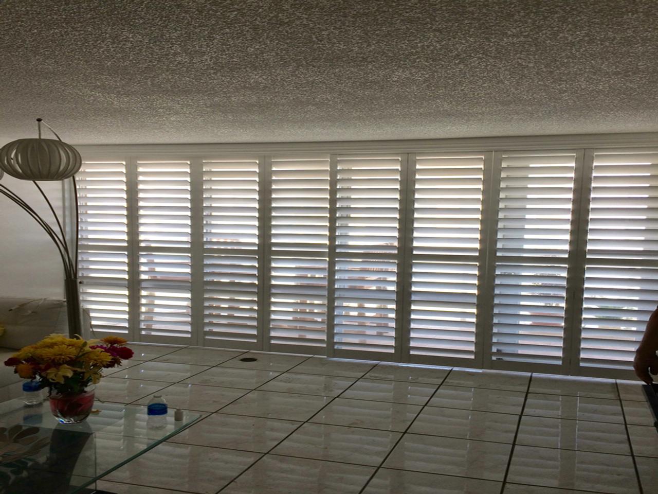 Sliding glass doors with bypass shutters