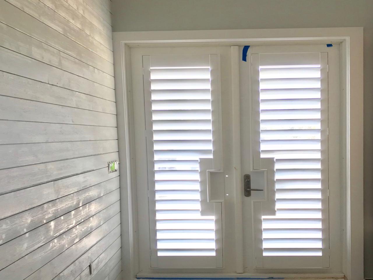 French doors with plantation shutters