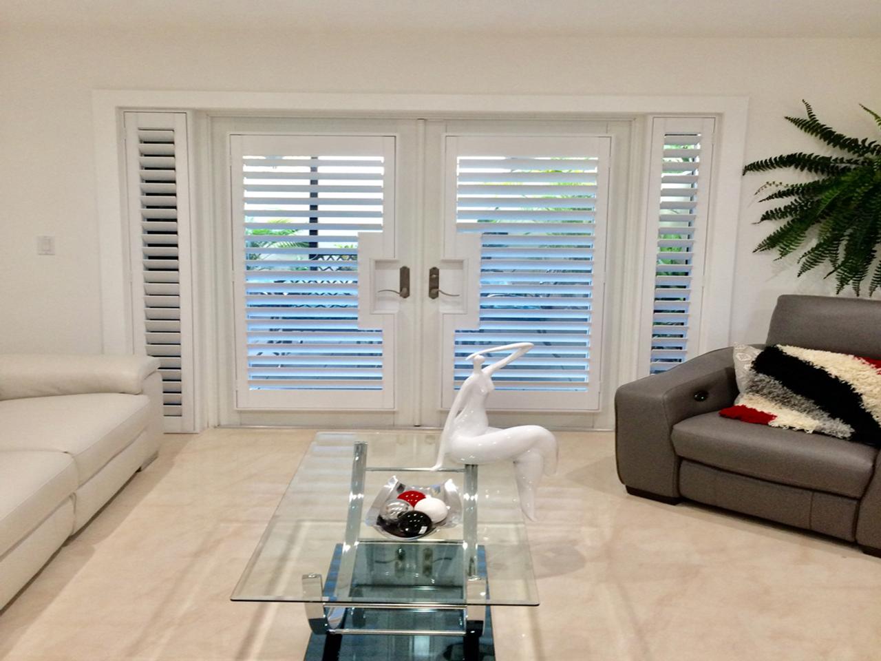 French doors with shutters in a modern living room