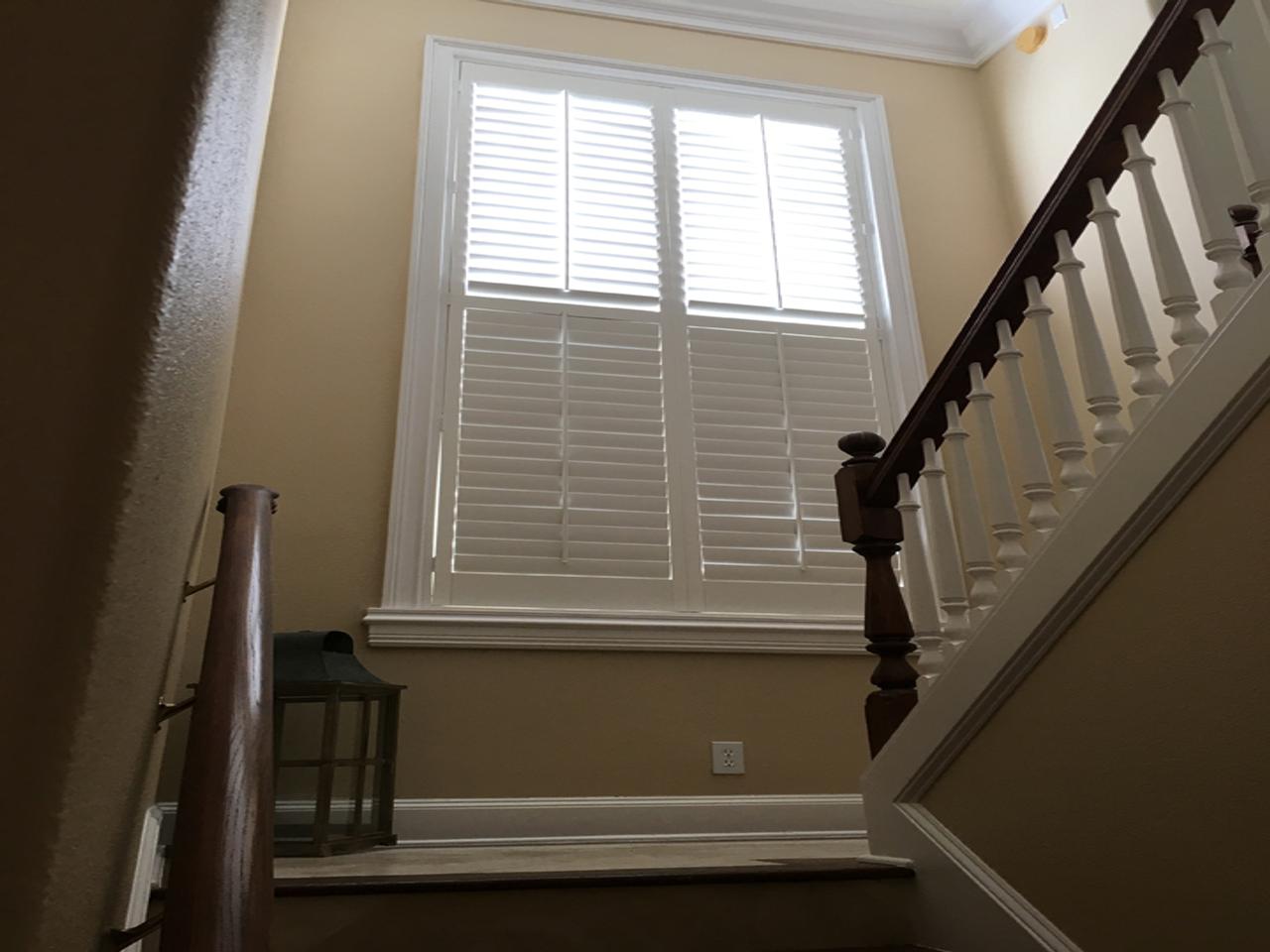 Traditional shutters on a stairway