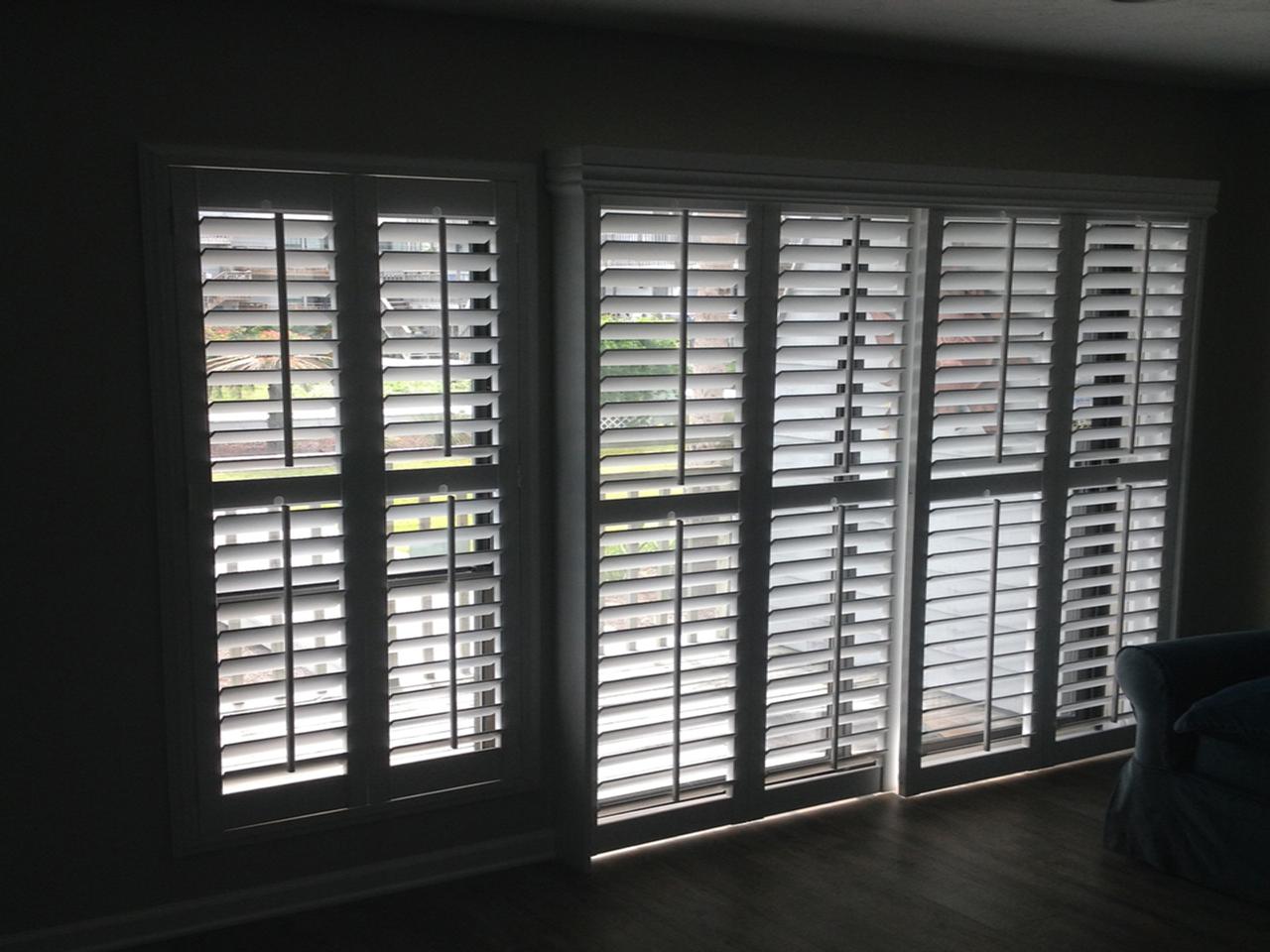 Bypass style sliding glass doors with plantation shutters
