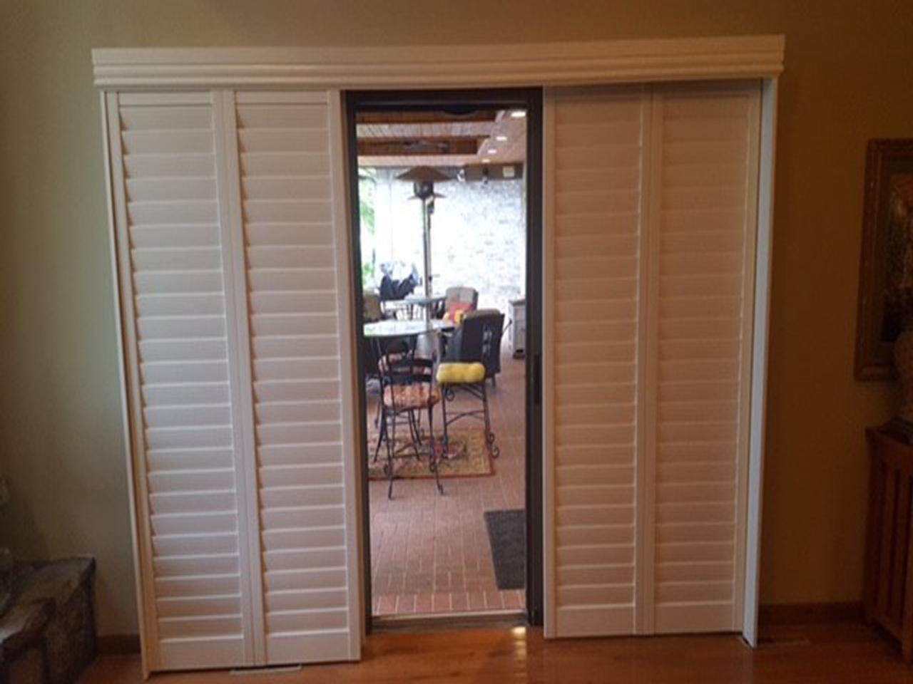 Bypass interior shutters with doors pulled to the sides