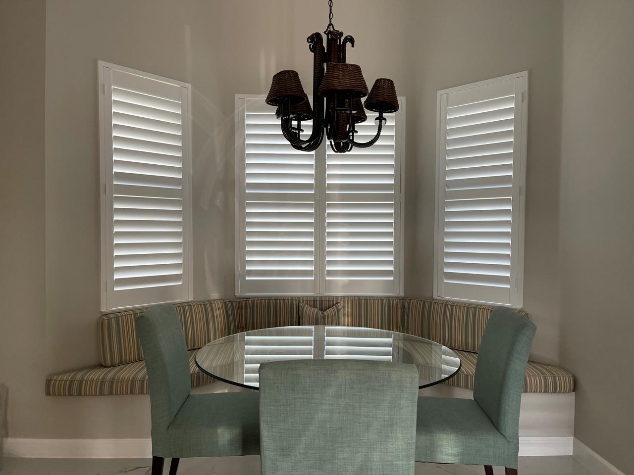 Bay window banquette with shutters