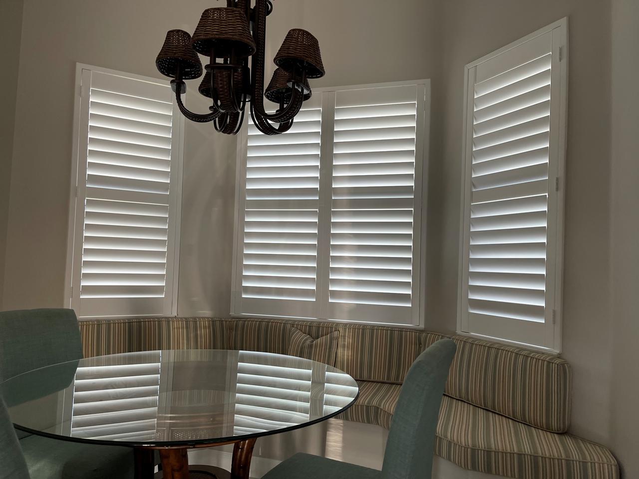Dining table with shutters