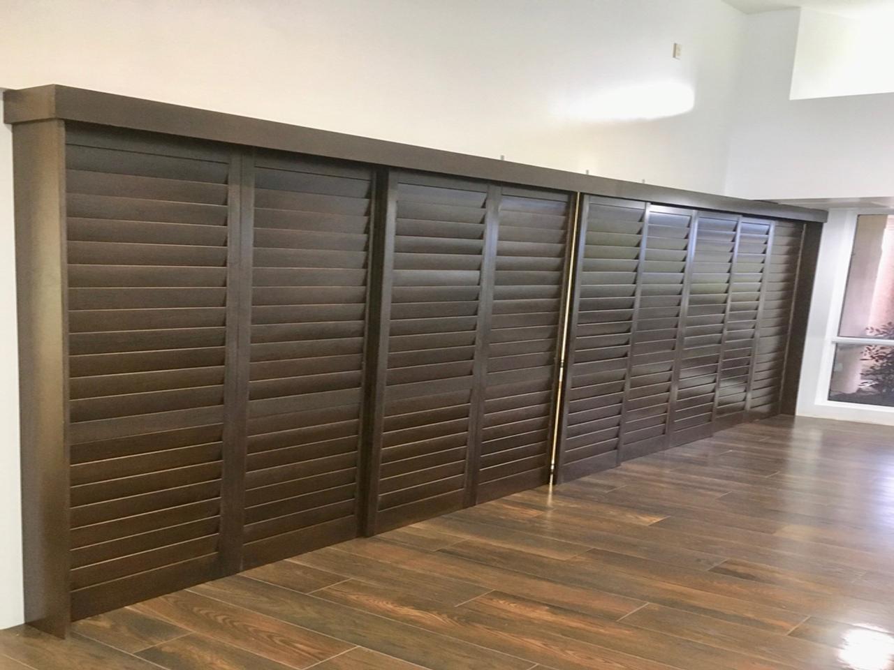 Closed stained shutters used as a room separator
