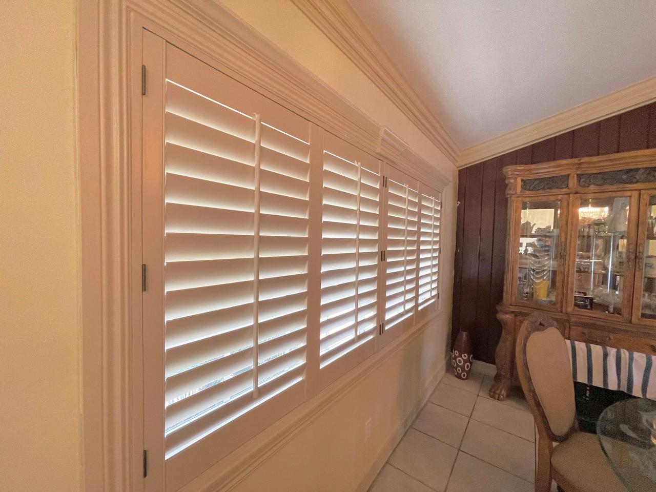 Plantation shutters in dining room