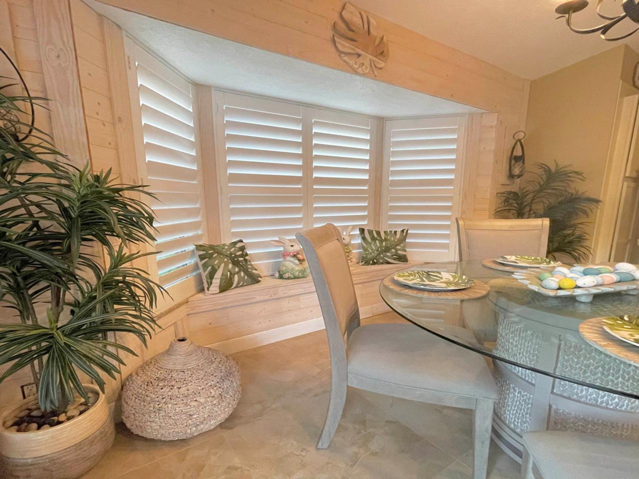 Bay window and seat with plantation shutters