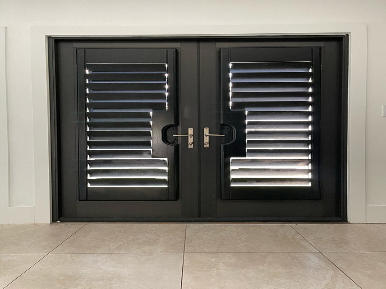 Dark Stained shutters on French Doors