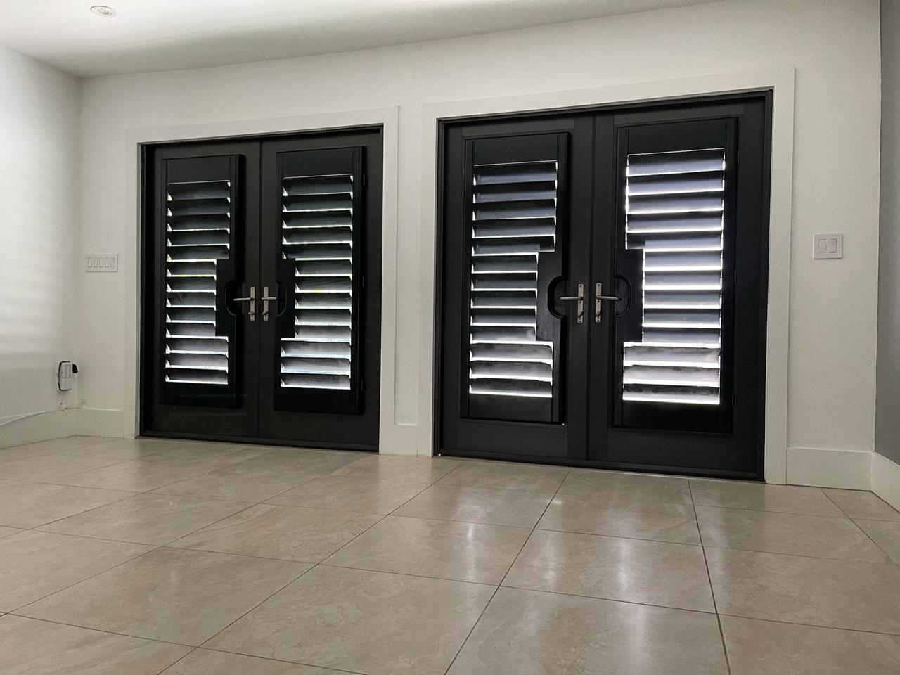 Sets of French Doors with interior shutters