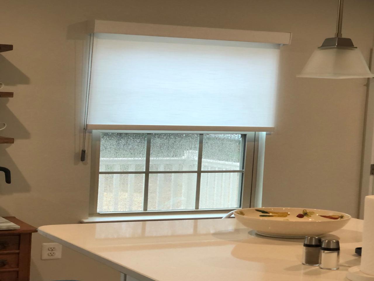 Roller shades in kitchen