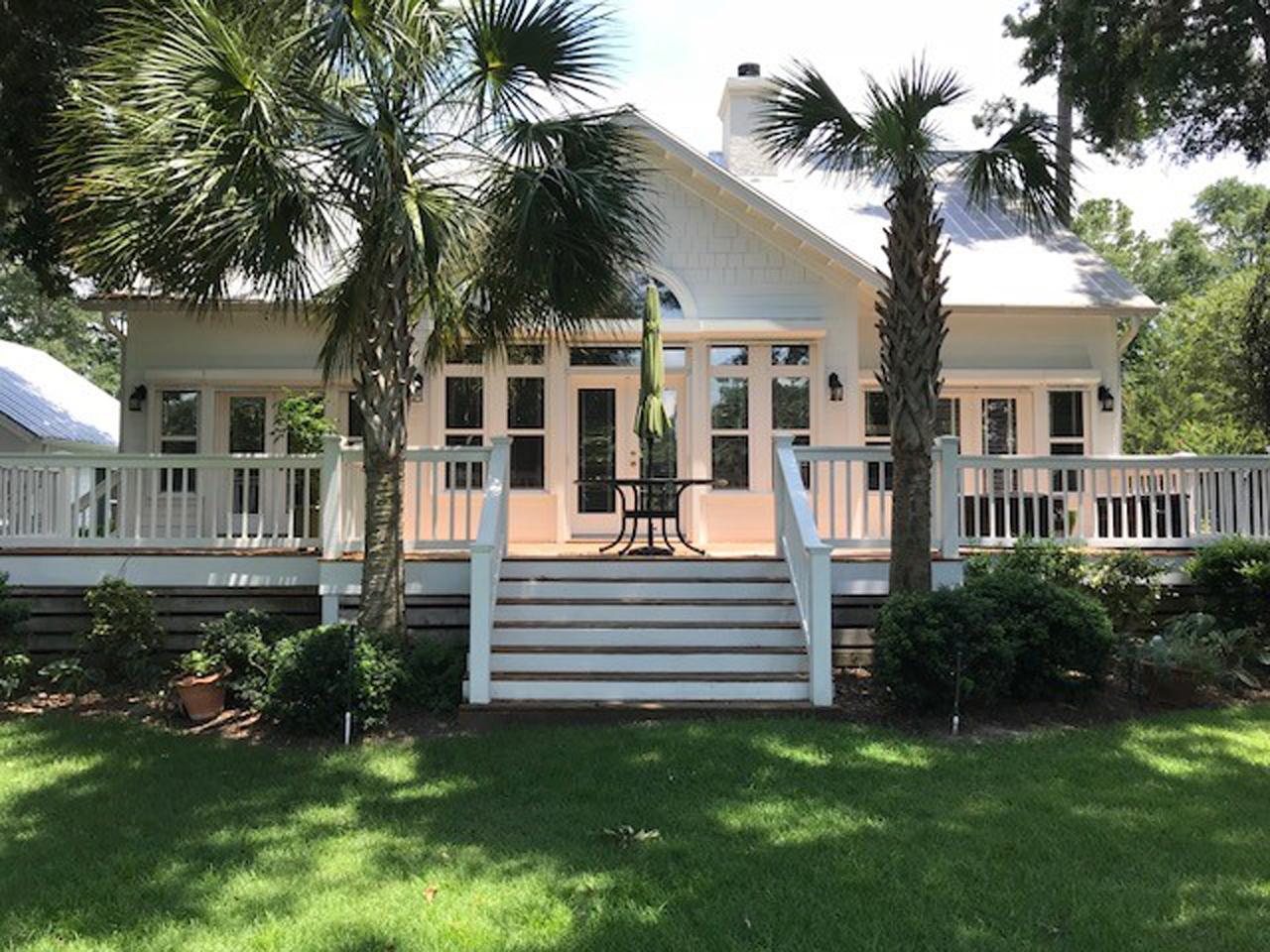 Raised hurricane shutters on a home