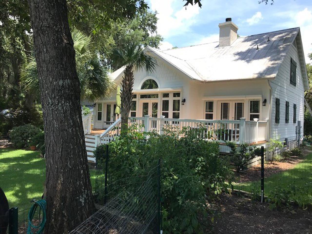 Back of a house with raised hurricane shutters