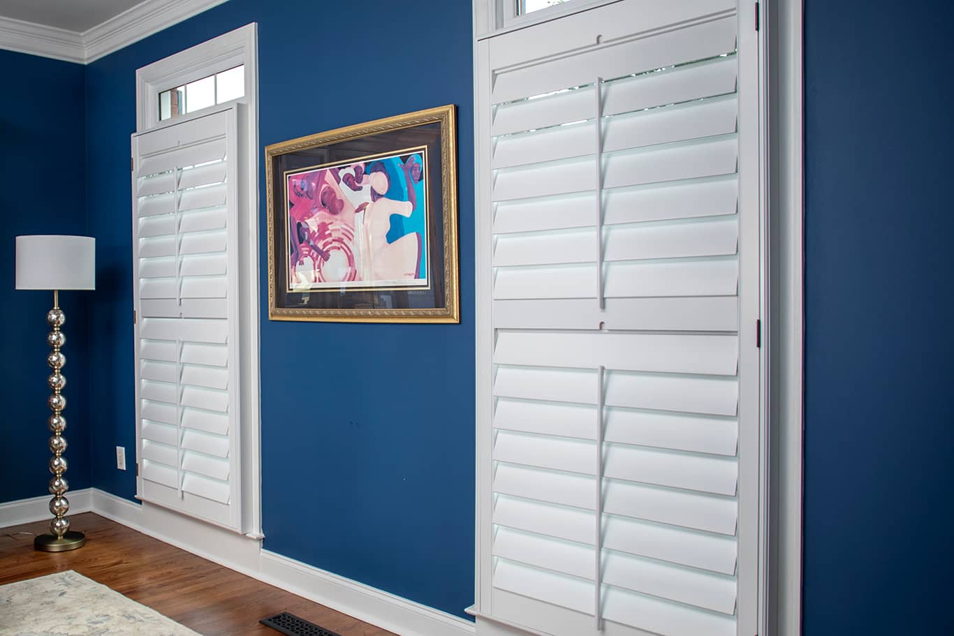 Heritage shutters in a blue living room