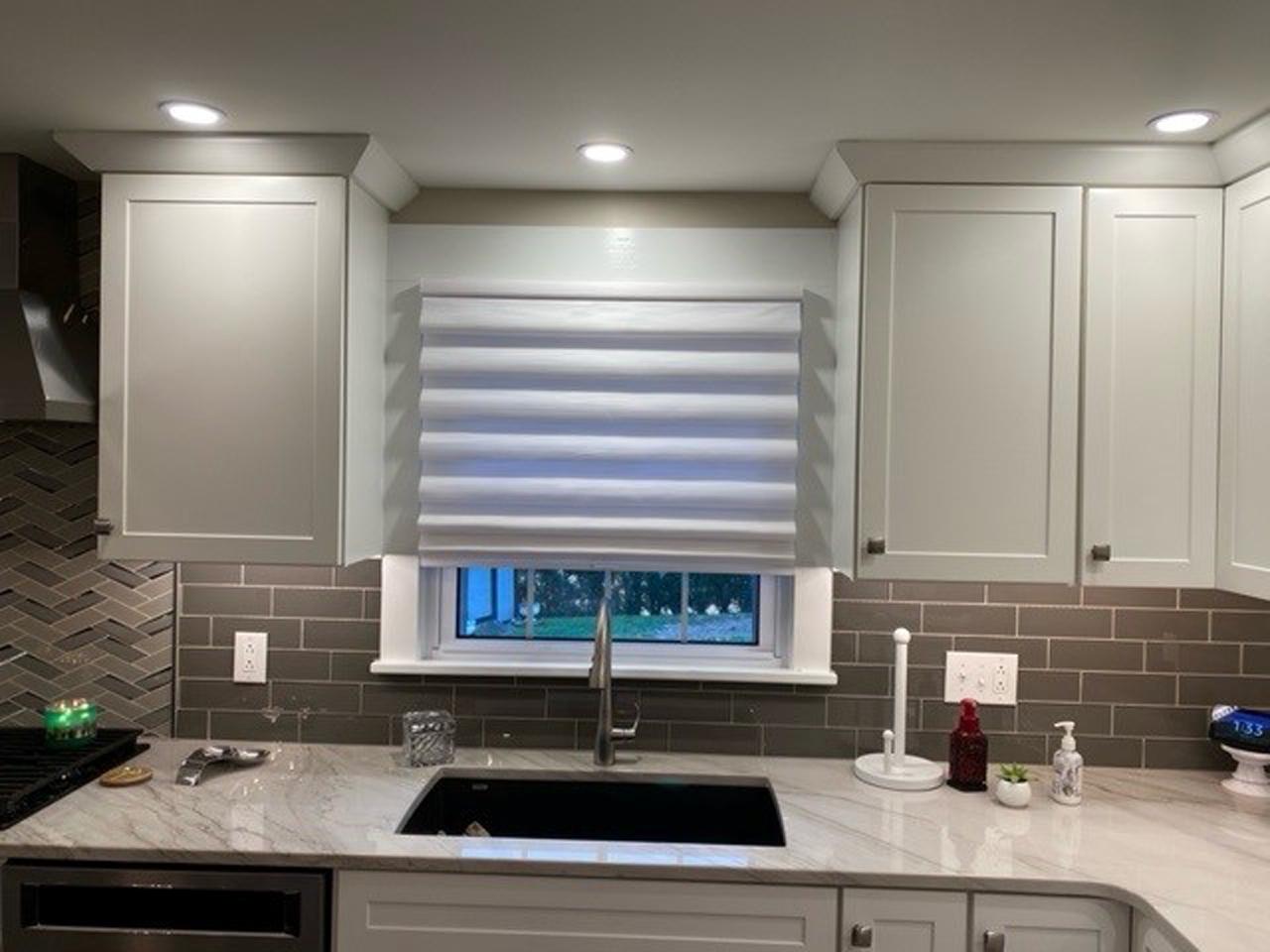 Solera shades over kitchen window