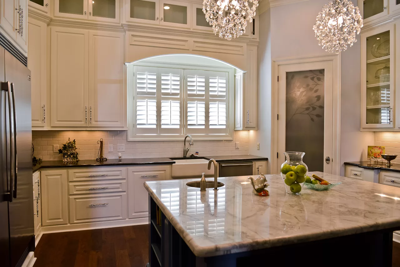 arched kitchen window with shutters