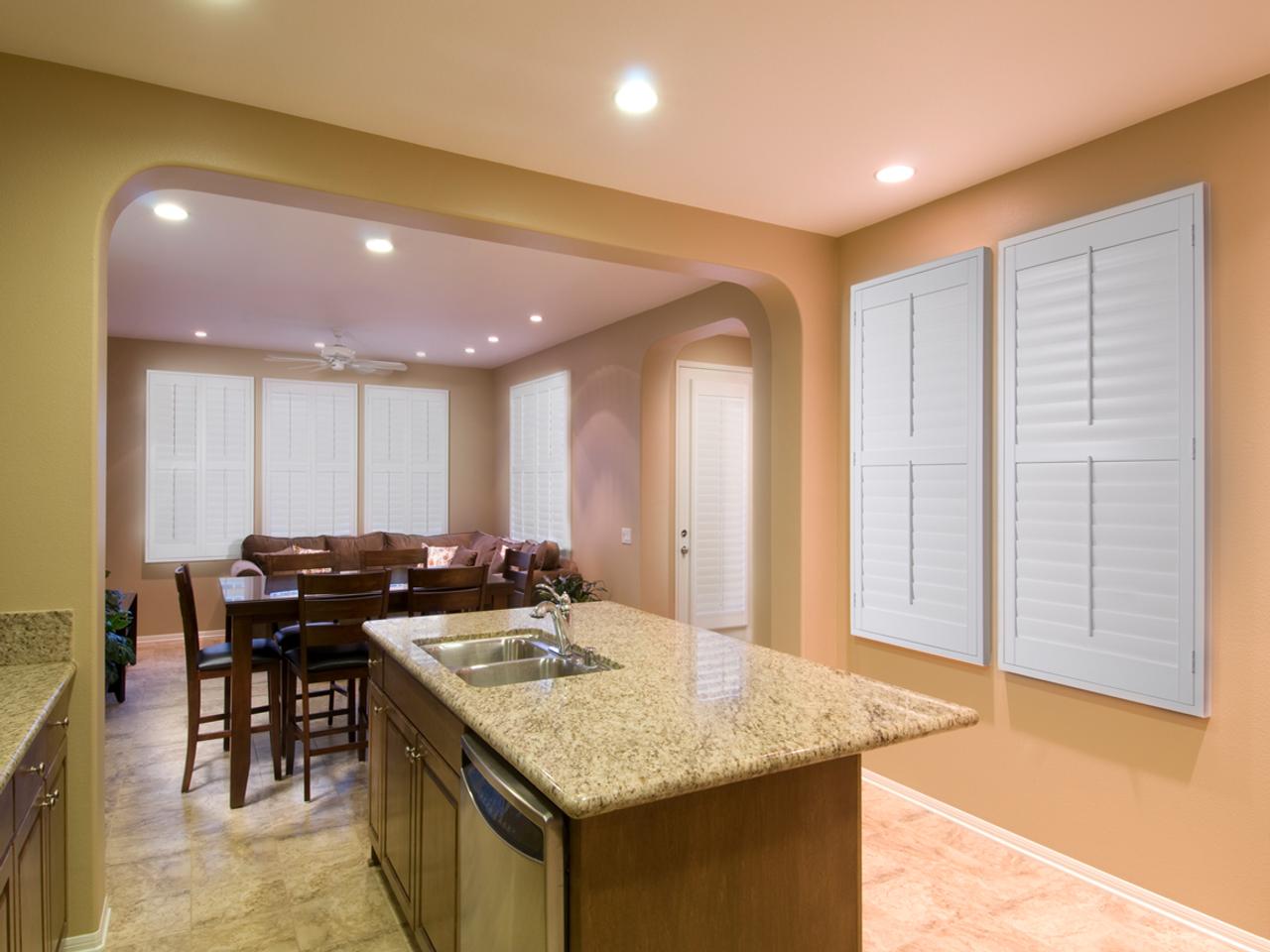 Shutters with louvers closed in kitchen dining area