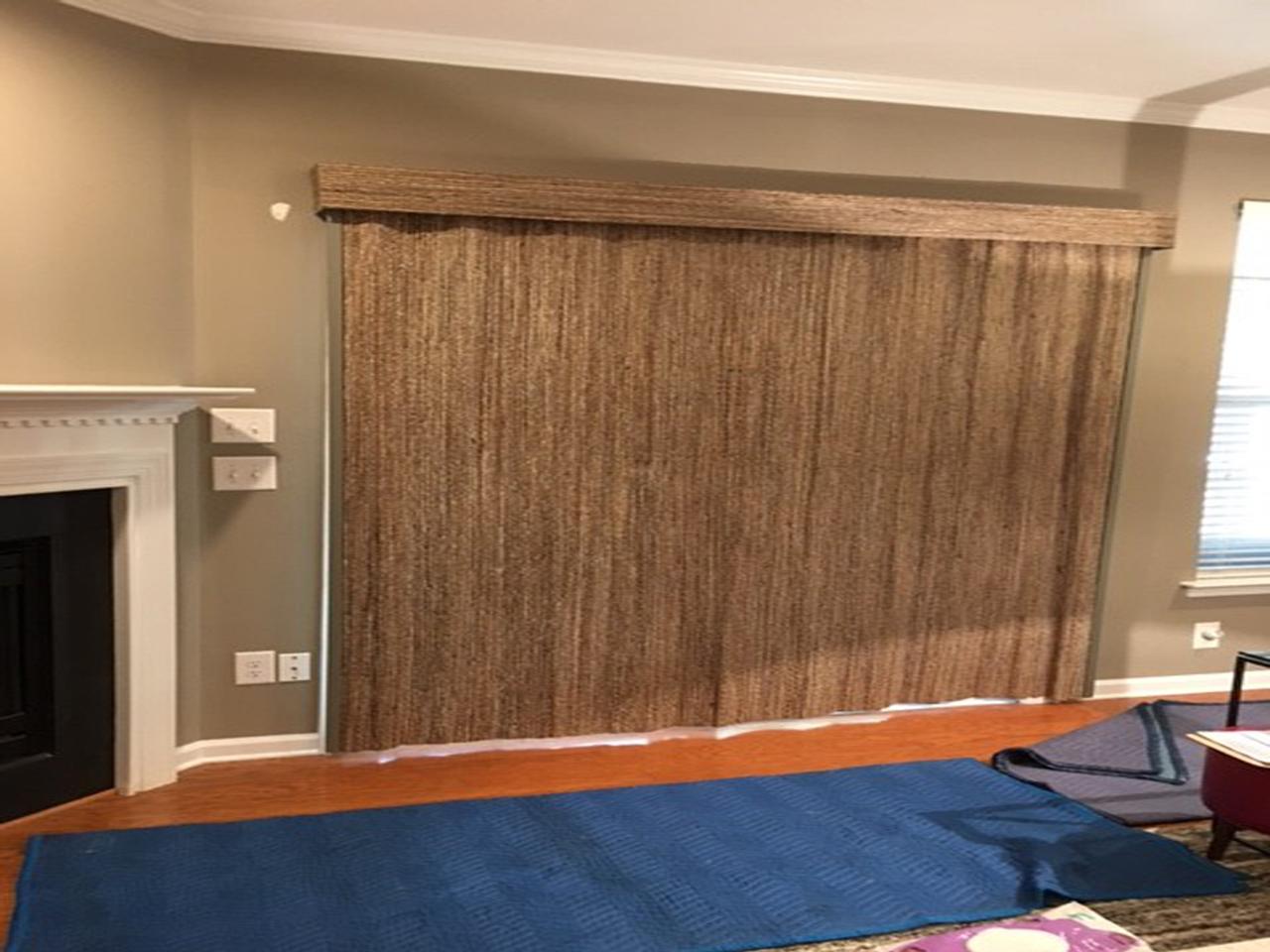 Vertical woven wood shades on sliding glass door