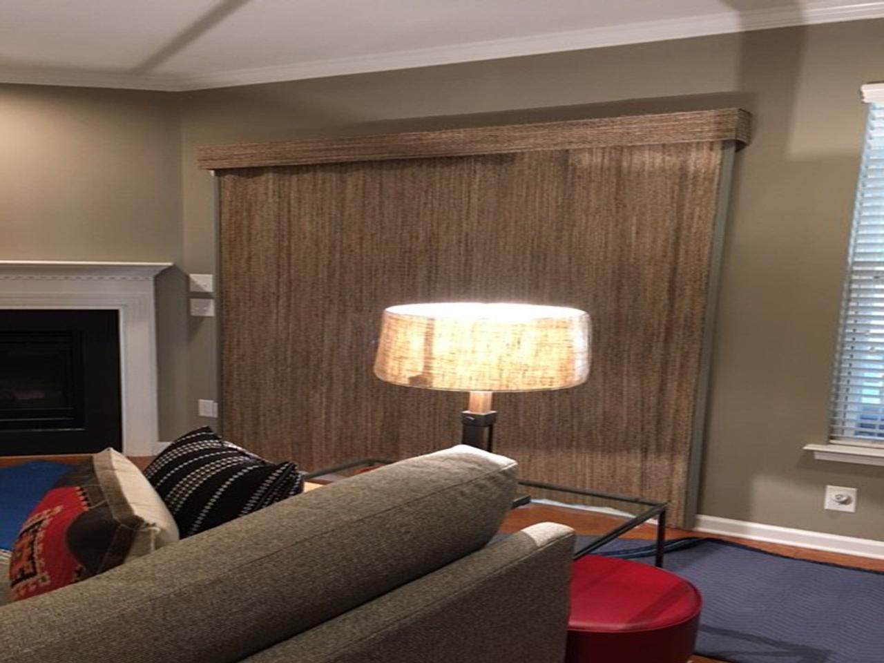 Closed woven wood shades in living room