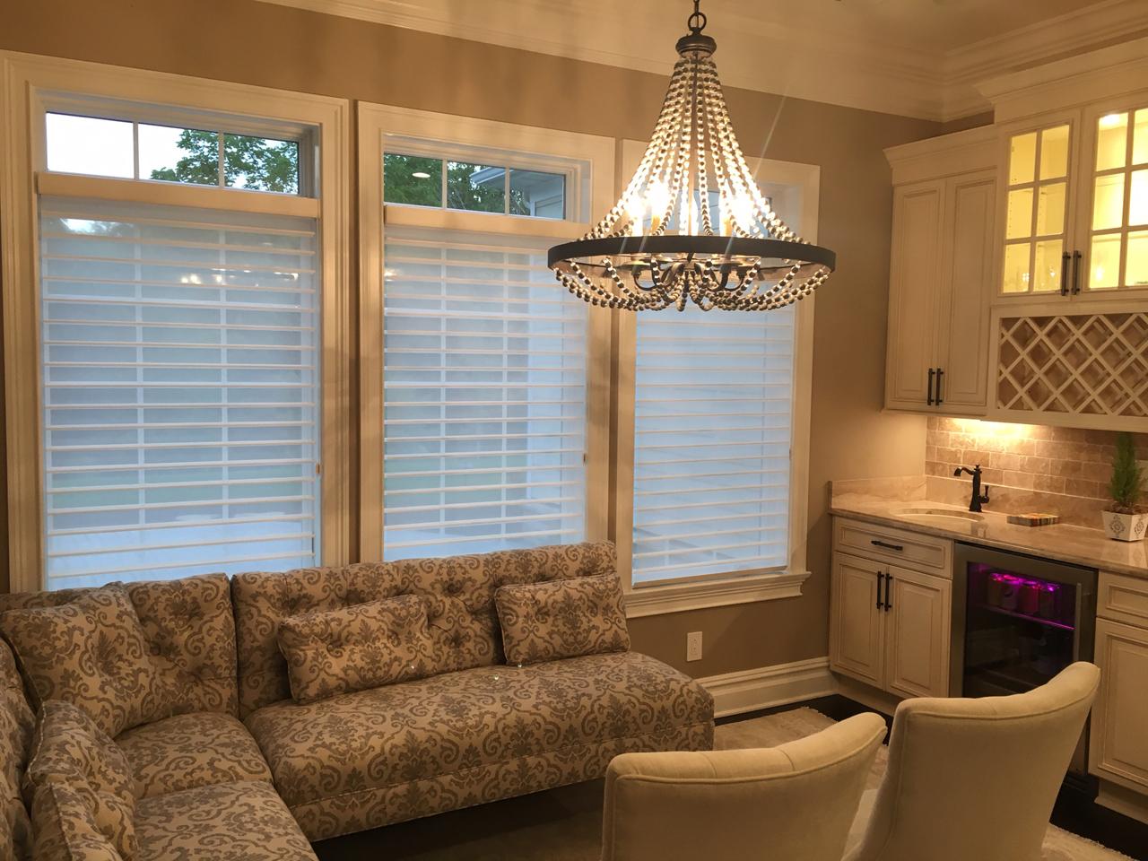 Silhouette shades in kitchen with open transom windows