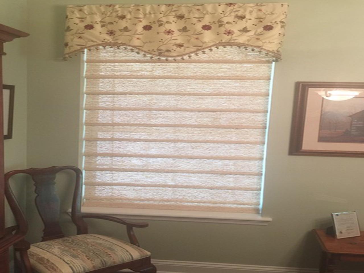 Hunter Douglas shades in a bedroom