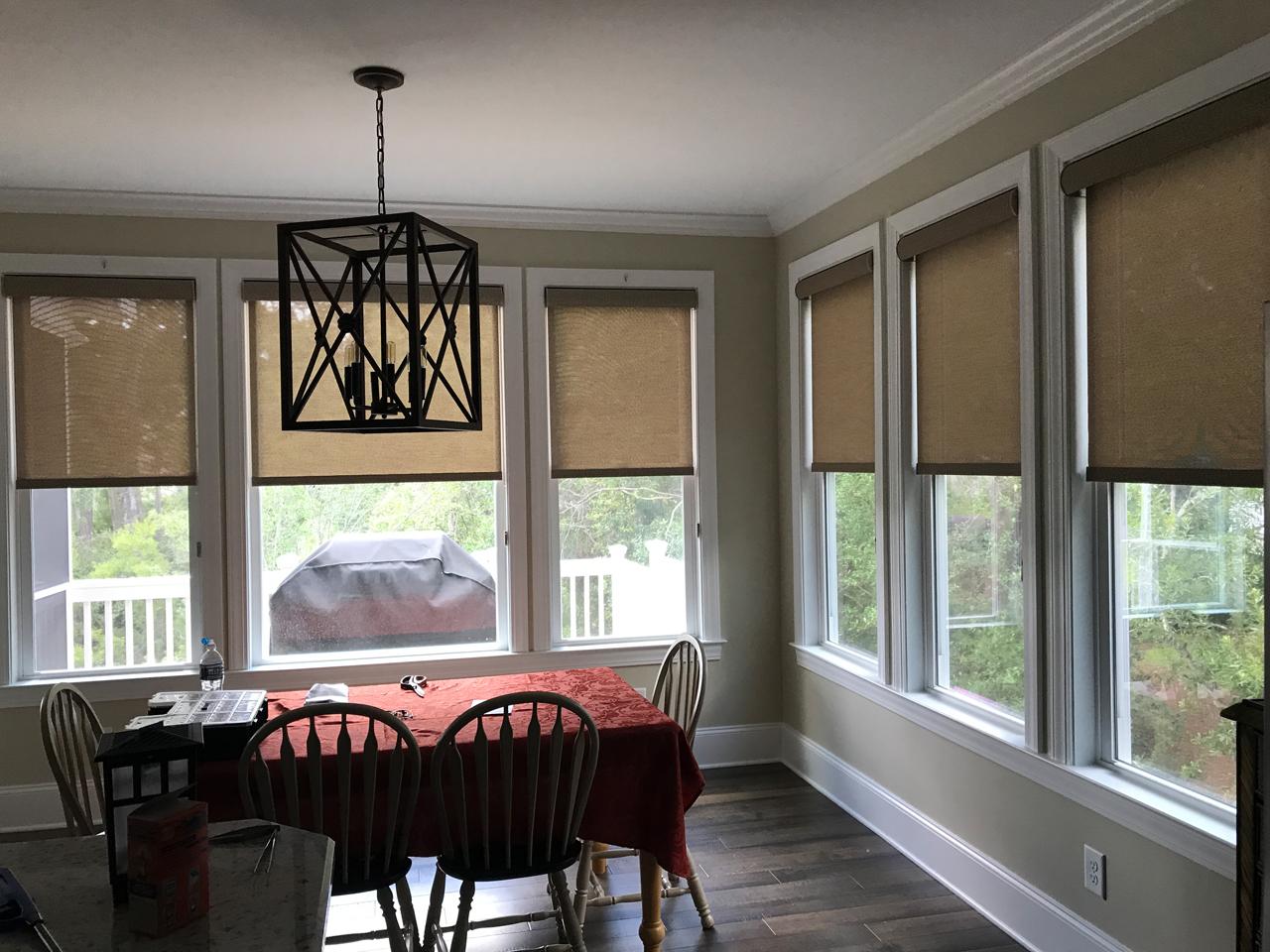 Screen shades in a sunroom