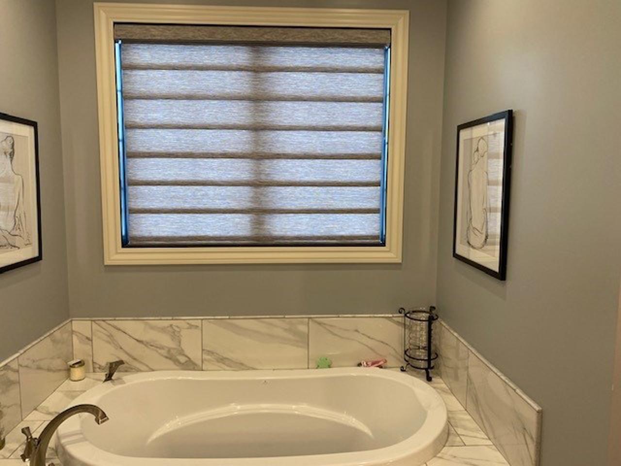 Design Studio Roman Shades over a bathtub