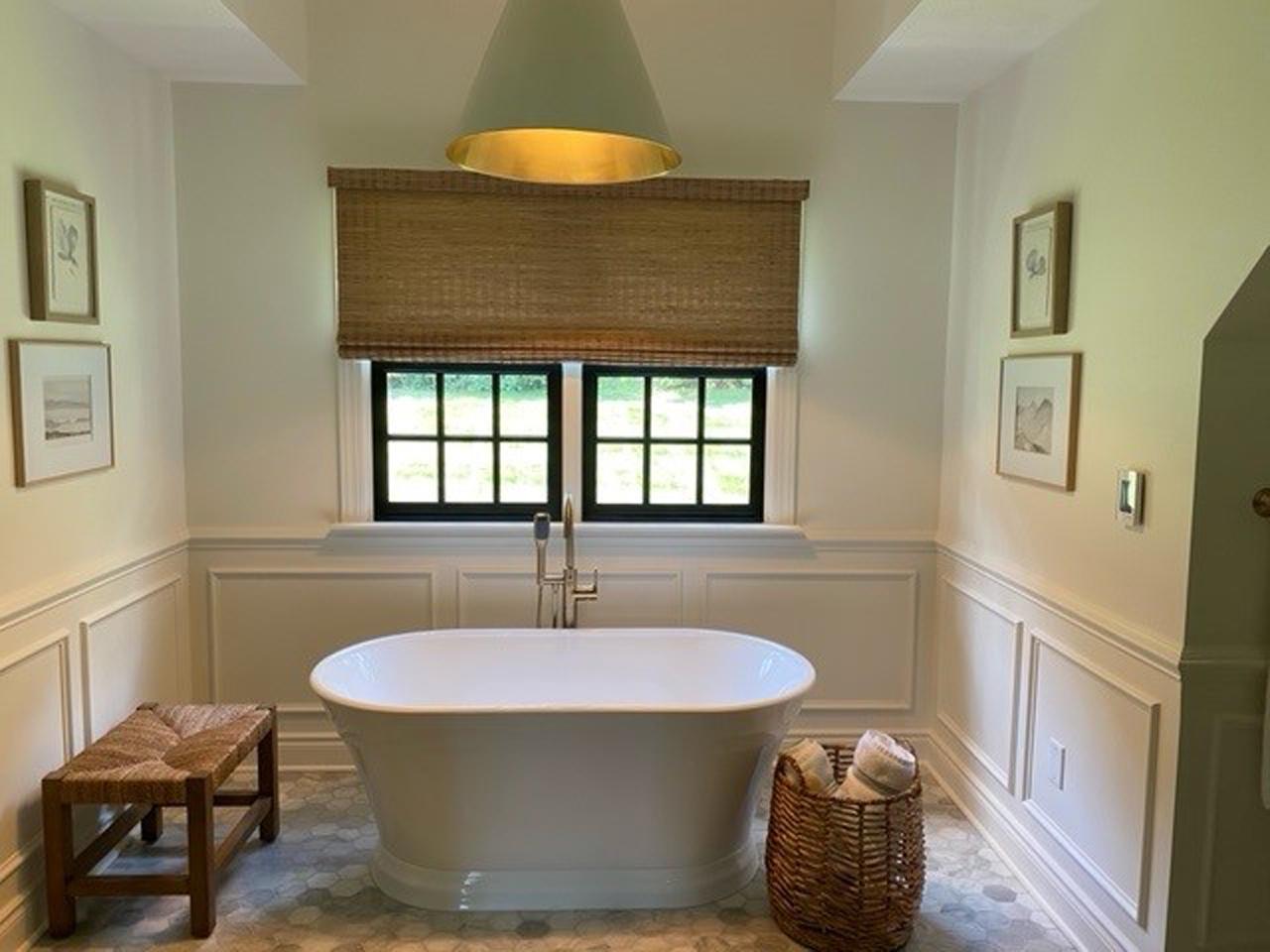 Woven wood shades over a tub