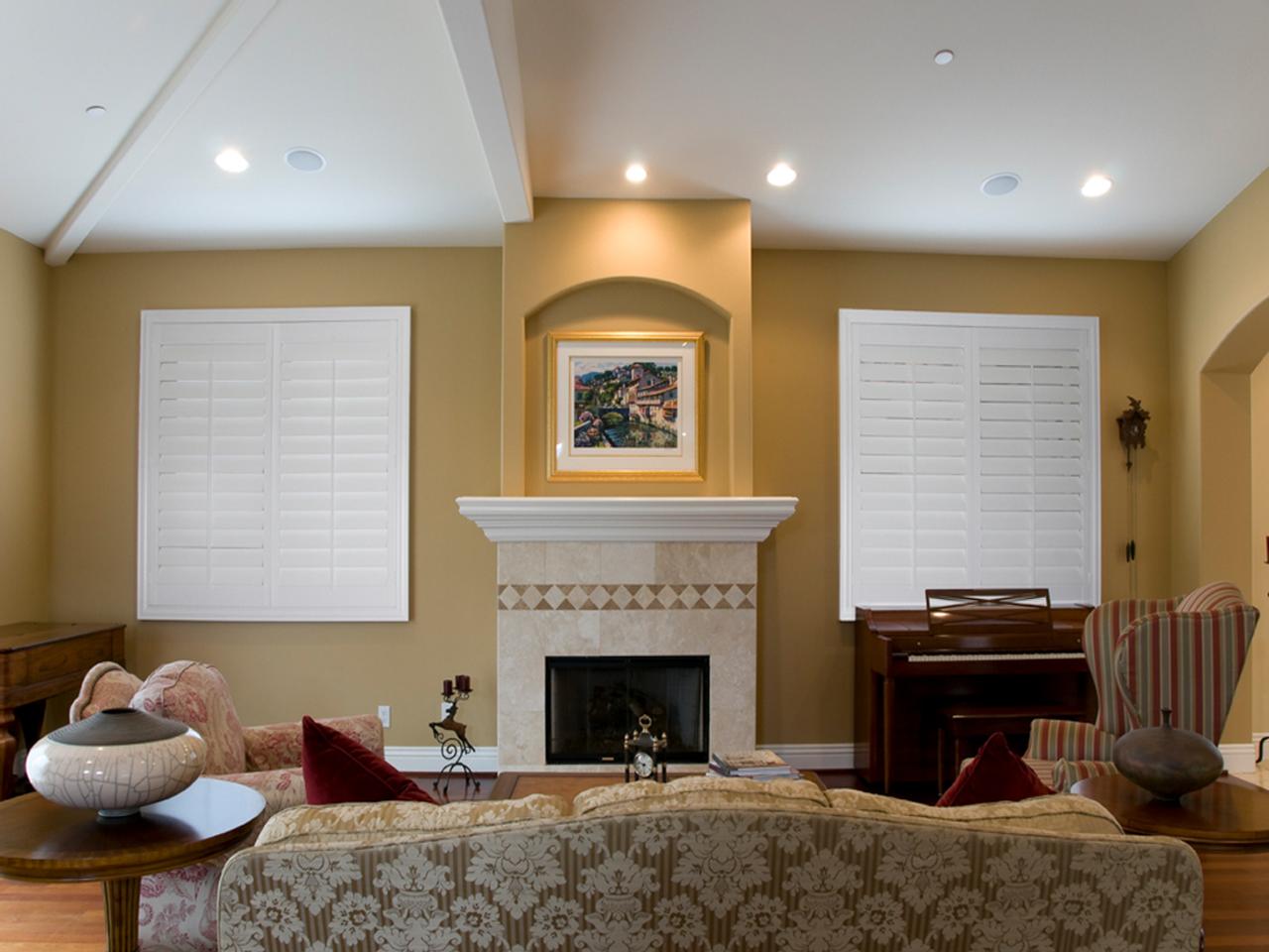 Louvers closed on shutters by fireplace