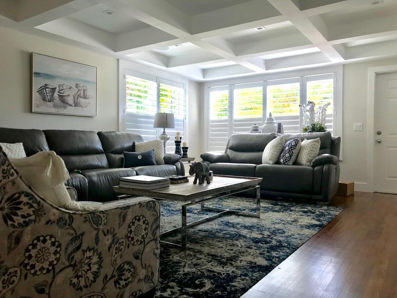 Living room with shutters partially closed