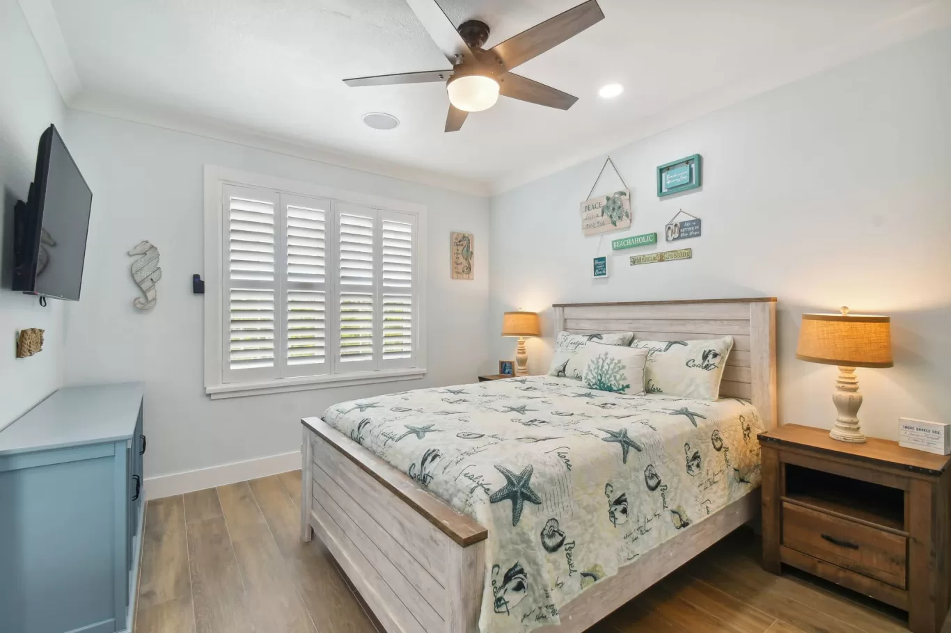 LouverWood Plantation shutters in a bedroom