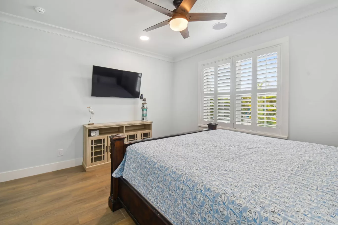 LouverWood Plantation shutters in a bedroom