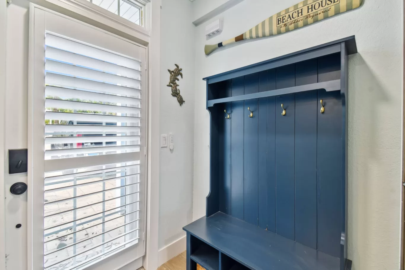 LouverWood™ Plantation Shutters on an entry door