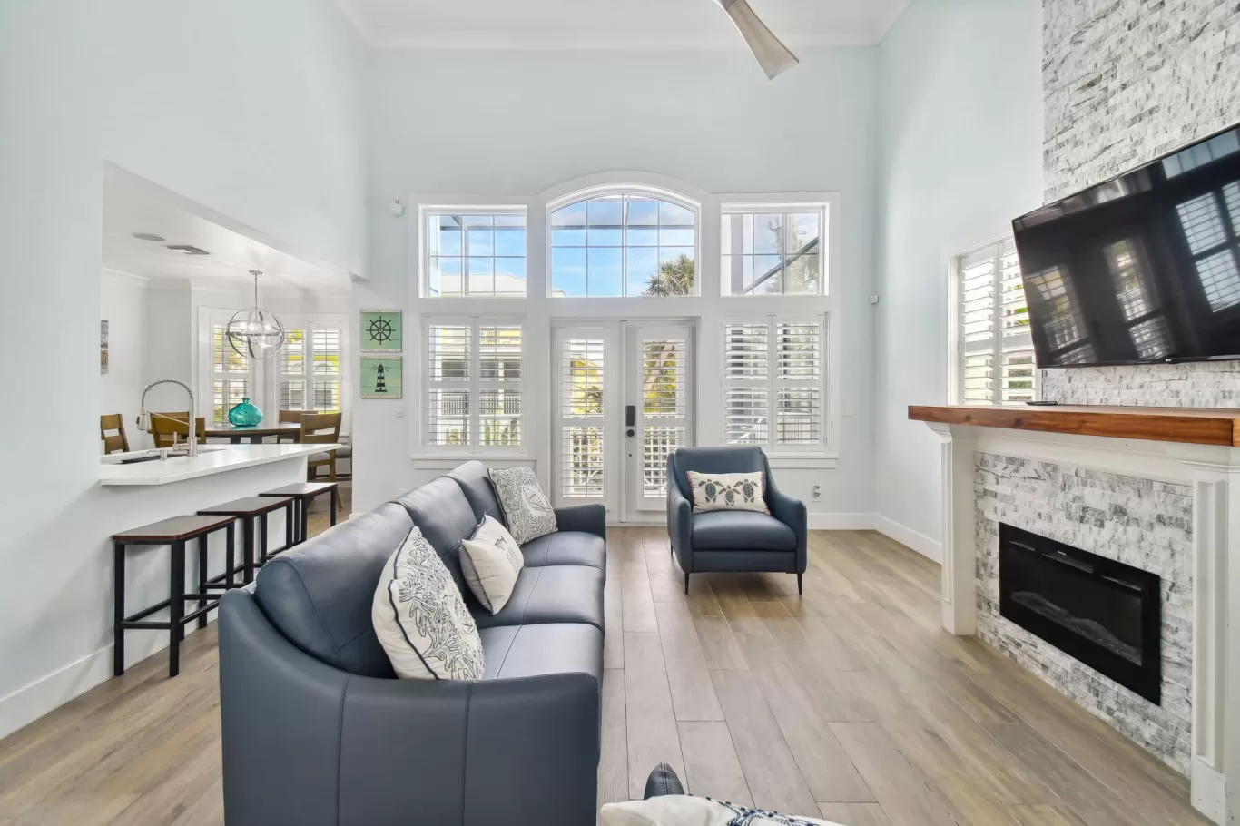 LouverWood Plantation Shutters on French doors in a living room