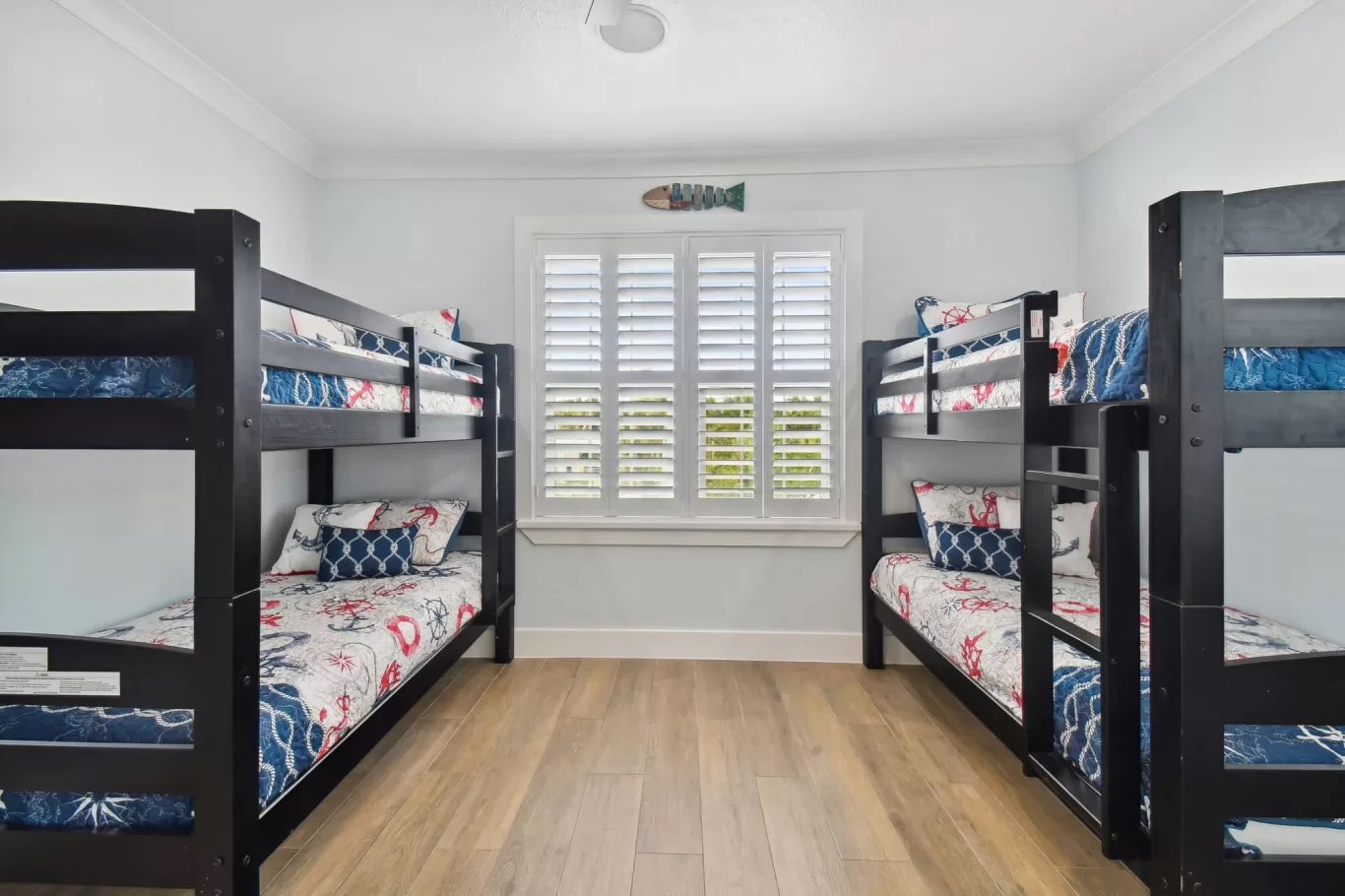 LouverWood Plantation shutters in a bedroom