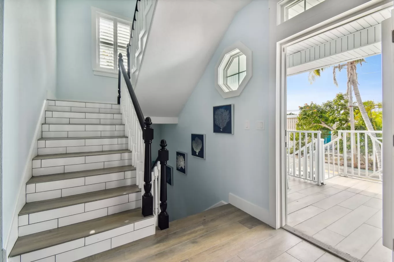 plantation shutters on stairway window