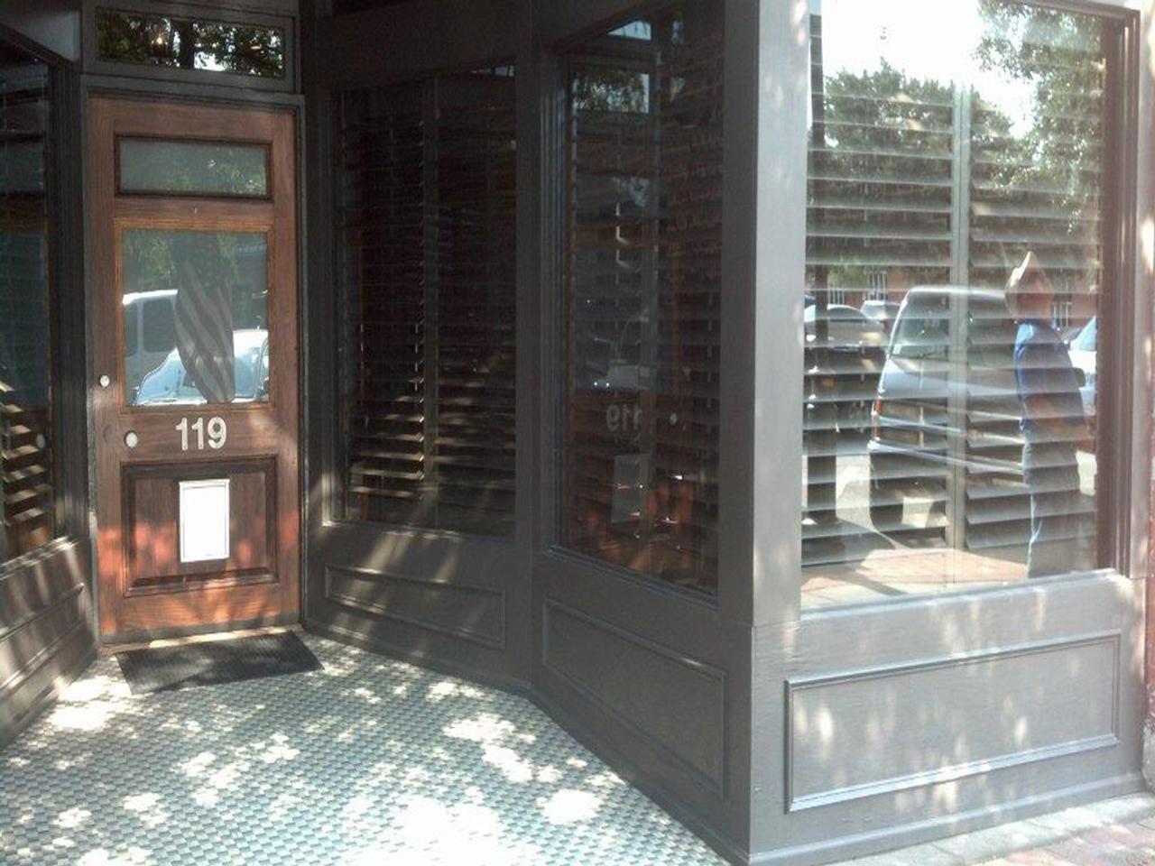 Exterior view of office with plantation shutters