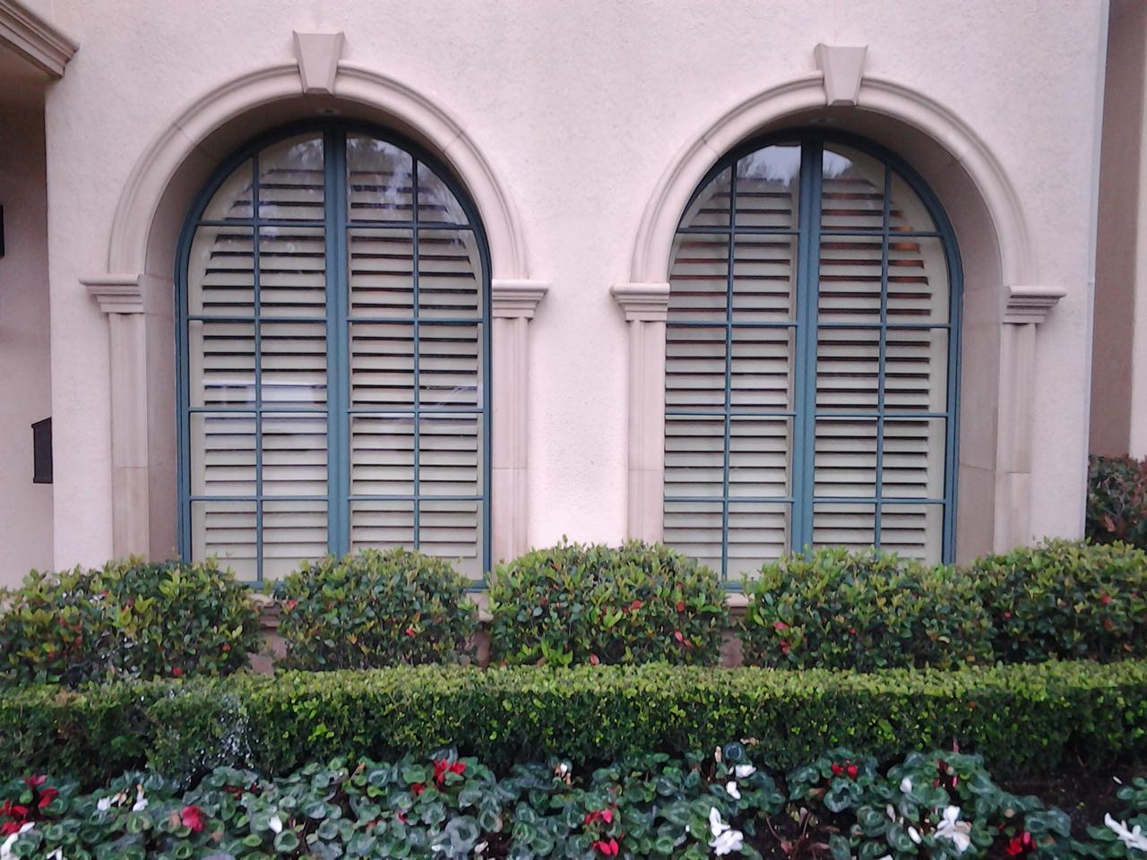 Exterior view of arched shutters