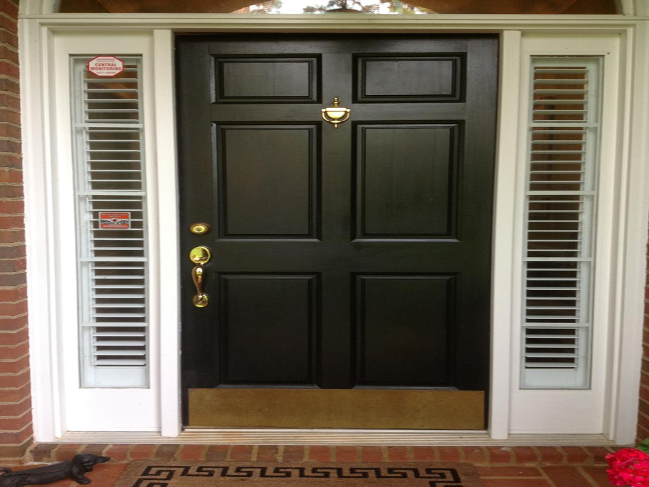 Sidelights with shutters on a traditional style house