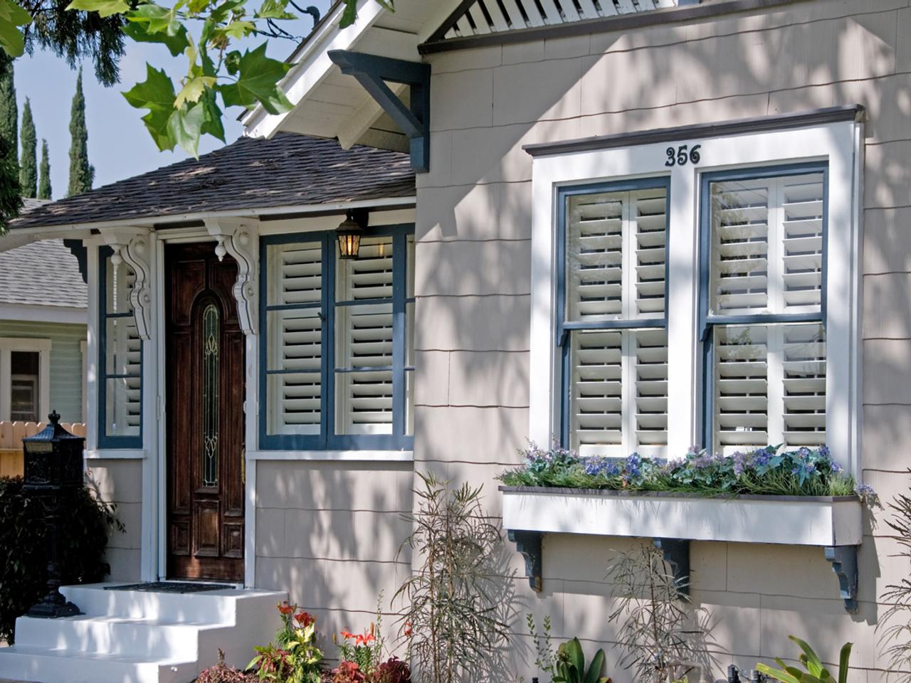 Exterior view of cottage with interior shutters