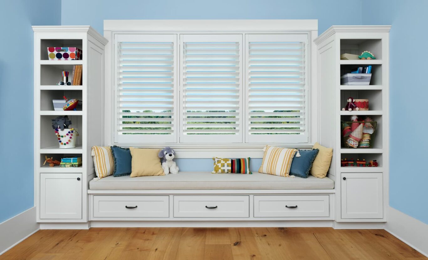 child's room with faux wood shutters on the windows