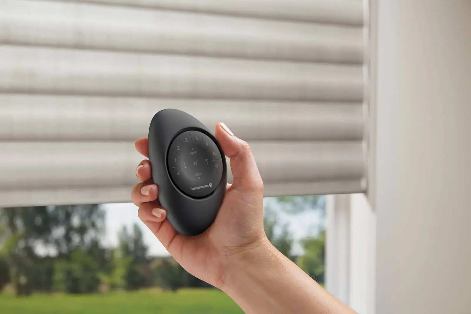 Pebble remote control for blinds and shades