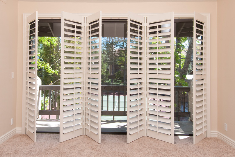 5 Best Window Treatments for Sliding Glass Doors - Louver Shop Shutters