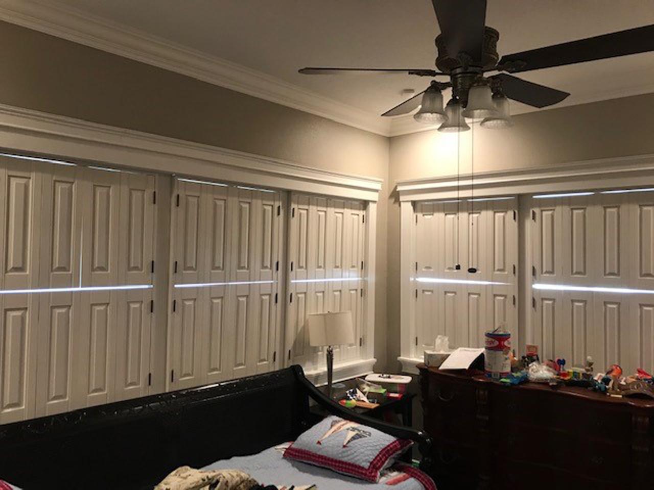 Big windows with raised panel shutters