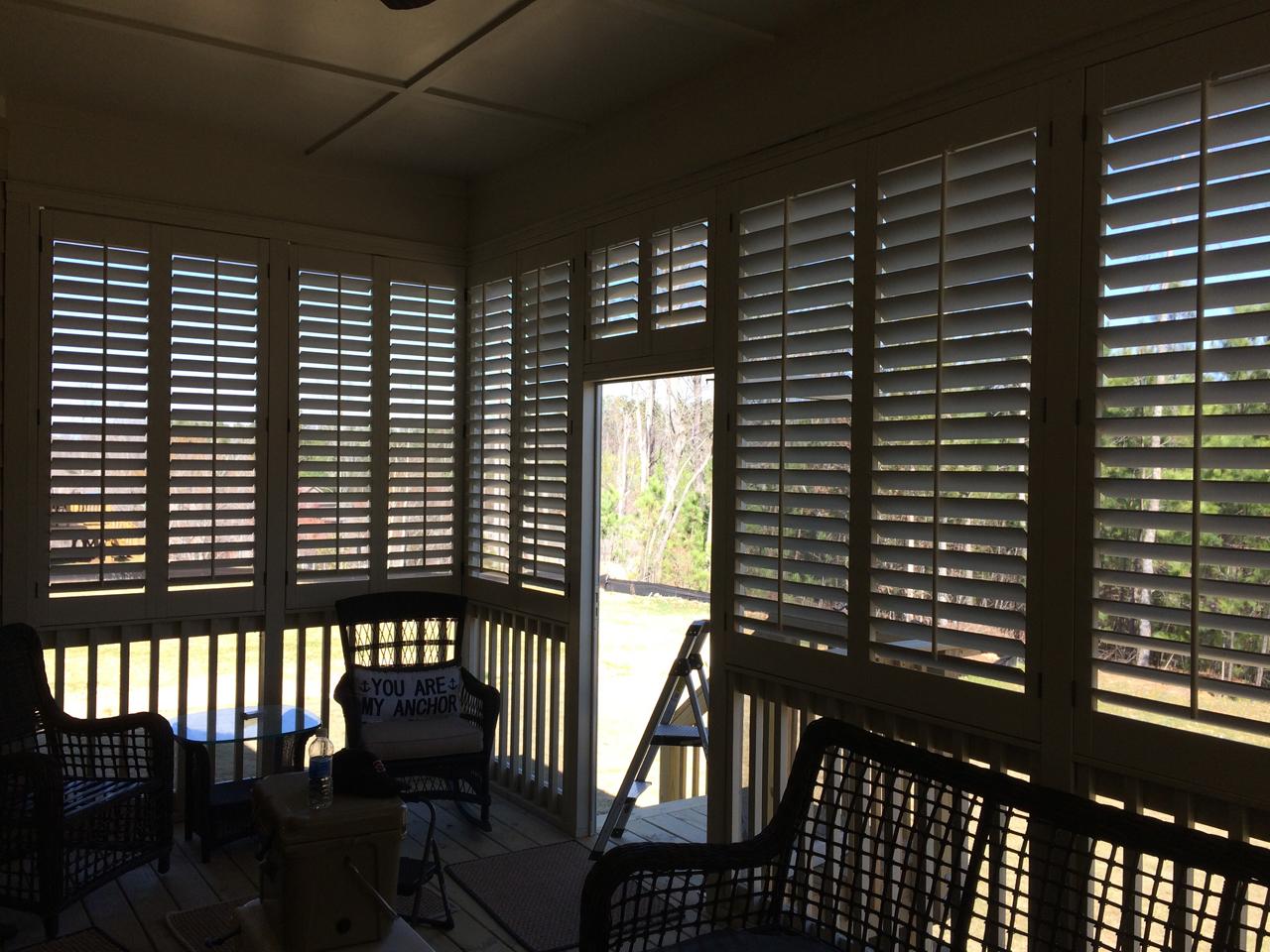 Louverwood shutters on a porch for privacy