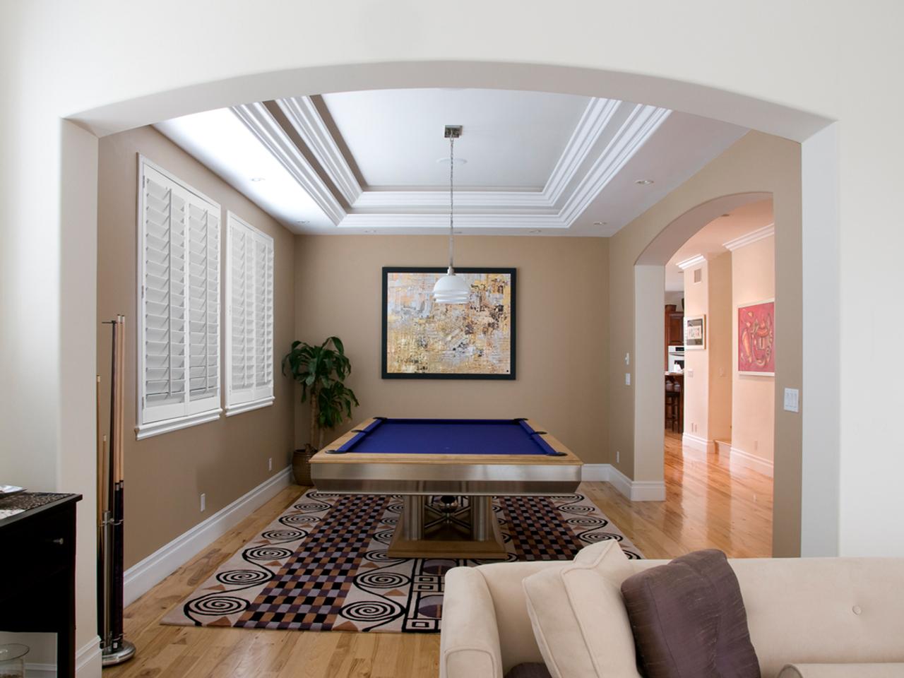 Interior shutters in a rec room with pool table