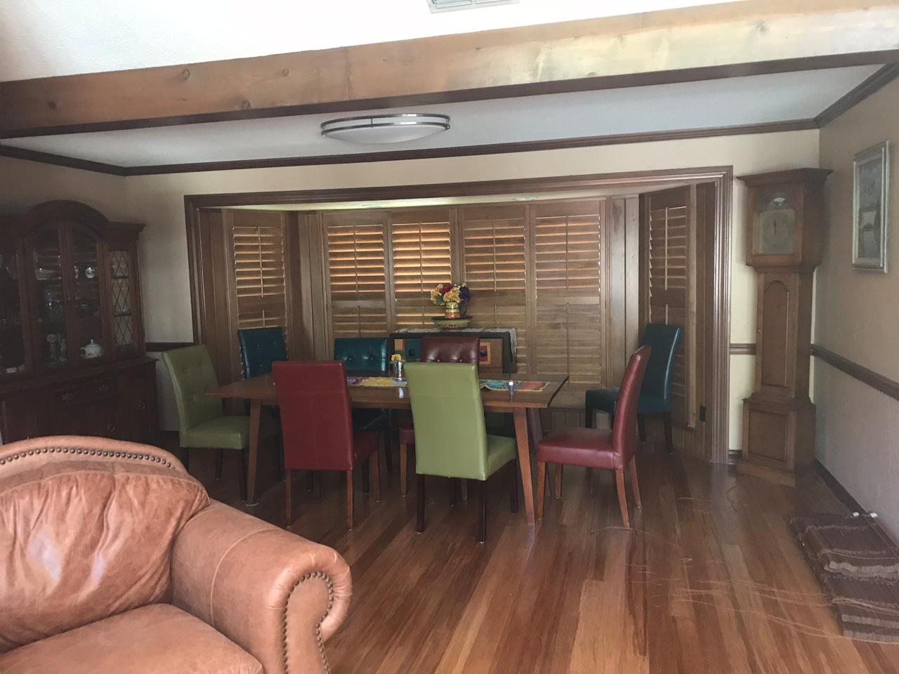 Dining room area with stained shutters