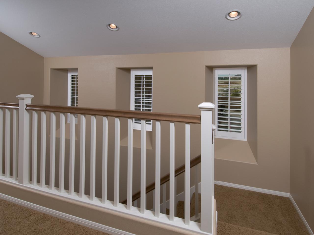 Interior shutters by stairs