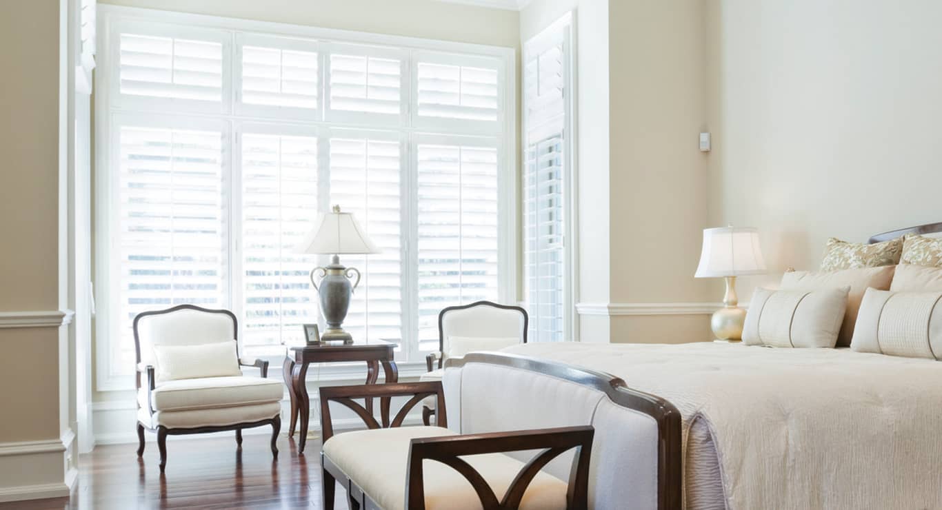 plantation shutters in a bedroom