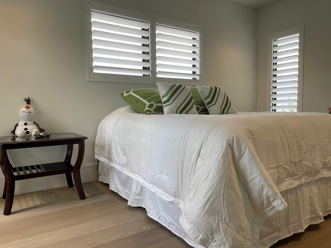 Shutters in guest bedroom