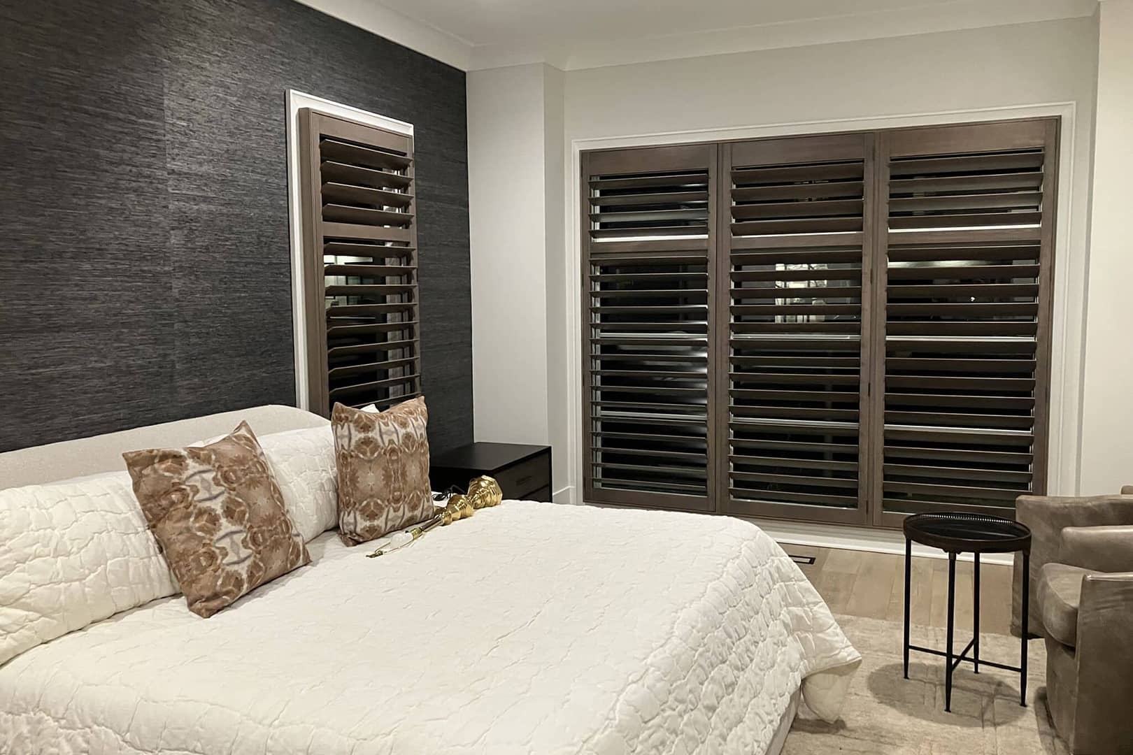 custom wood plantation shutters on bedroom windows